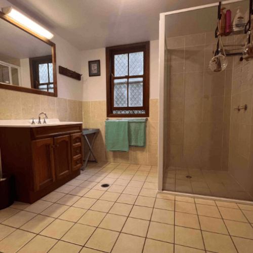 spacious bathroom with large shower